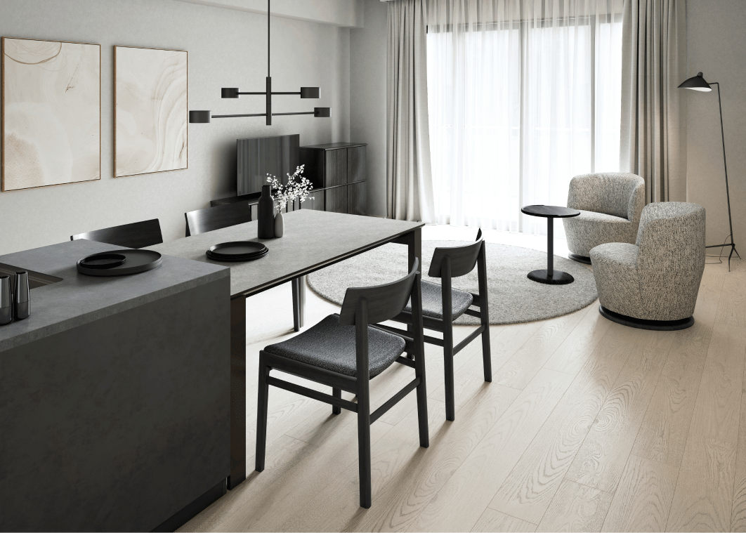 実際の部屋で黒いダイニングテーブルとソファを配置したリビングダイニングの写真